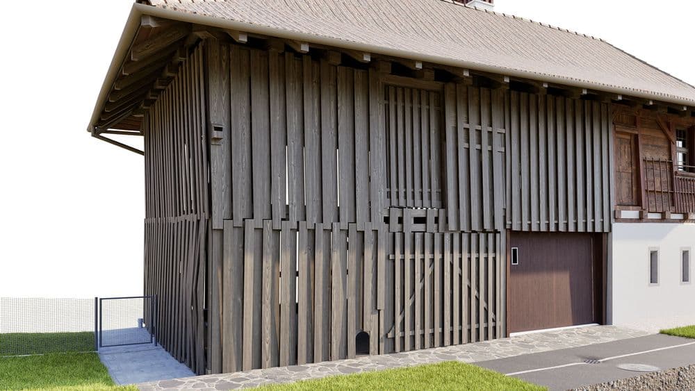 Holzgebäude mit rustikalem Design, seitlicher Eingang, umgeben von einem gepflegten Rasen.